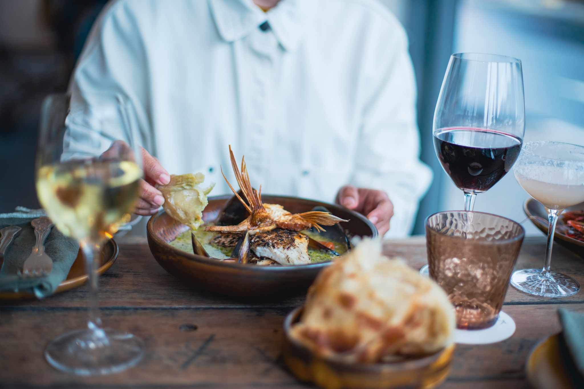 Person enjoying a meal at the restaurant Karkalla in Byron Bay