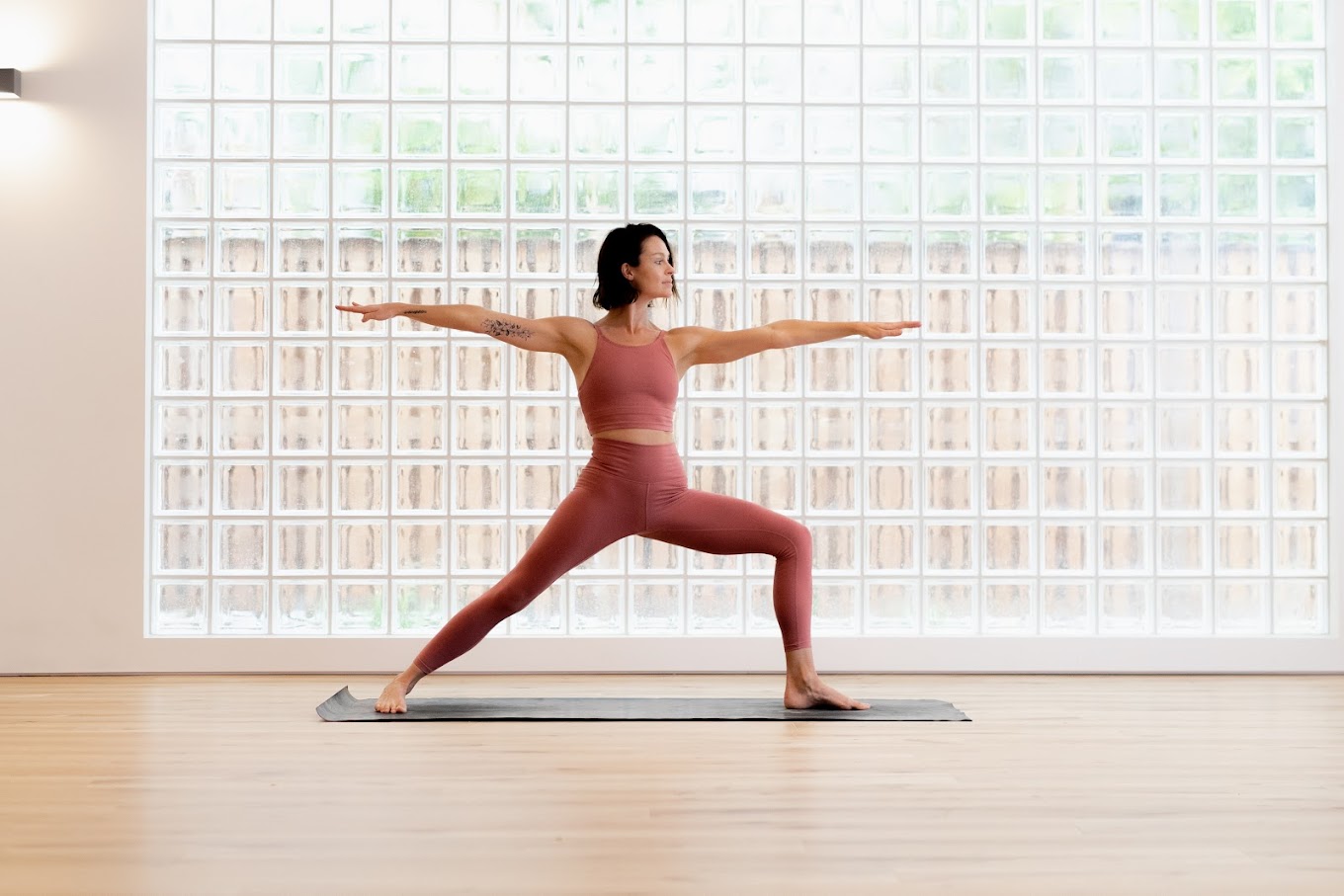 Yogi Stretching At Body Mind Life Yoga Studio In Byron Bay